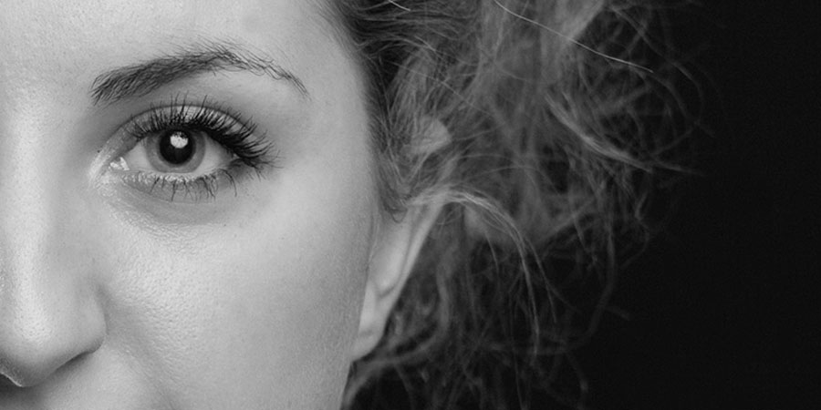 Close-up headshot of female model